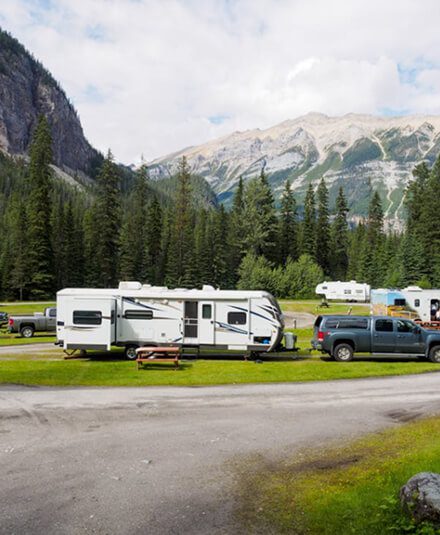 Luxury restroom trailer setup at a scenic campground